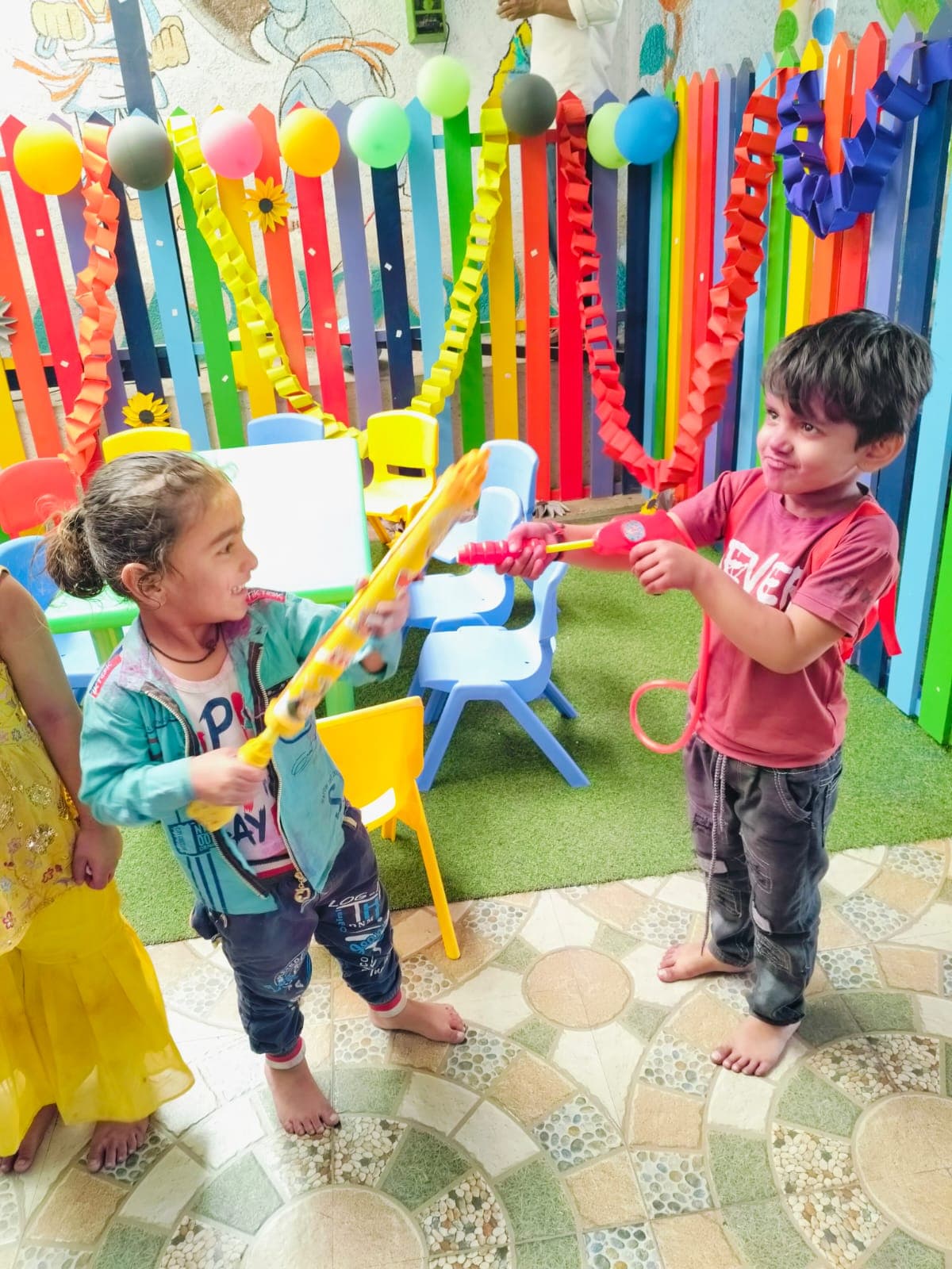 Children enjoying a colour day play activity